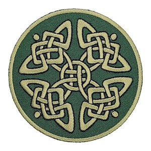 May include: A green and gold embroidered Celtic knot patch. The knot is a traditional Irish design.