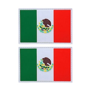 May include: Two embroidered patches featuring the Mexican flag. Each patch is rectangular with a white border and a stitched design. The flag is green, white, and red with the Mexican coat of arms in the center.