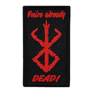 May include: Black embroidered patch with a red "You're already DEAD!" text and a red stylized symbol.