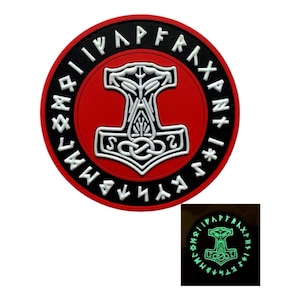May include: A red circular patch with a black border and white Norse runes around the edge. The center of the patch features a white Mjolnir hammer with a knotwork design. The patch glows green in the dark.