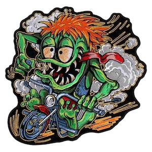 May include: Green monster with orange hair riding a motorcycle with smoke coming out of the exhaust. The monster has a big toothy grin and is wearing a blue shirt.