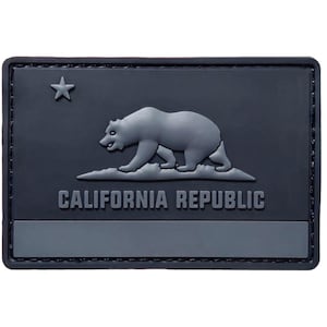 May include: Black and gray California Republic patch with a bear and a star. The patch has a stitched border.