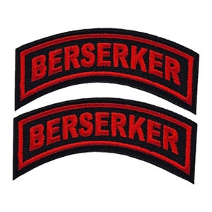 May include: Two black and red embroidered patches with the word "BERSERKER" in red lettering.