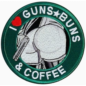 May include: Green and white embroidered patch with the text "I ♥ GUNS & BUNS & COFFEE" with a cartoon image of a person's backside with a gun in their back pocket.