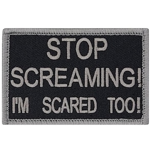May include: Black embroidered patch with gray text that reads "STOP SCREAMING! I'M SCARED TOO!"