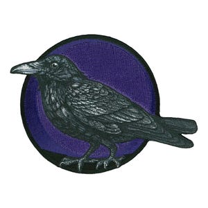 May include: A black crow with detailed feathers is perched on a purple circle. The crow is facing left and has its wings folded. The circle is outlined in black.