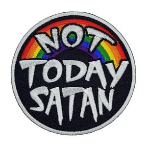 May include: A black and white embroidered patch with a rainbow arc above the text "NOT TODAY SATAN".