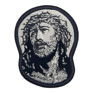 May include: Black and white embroidered patch of Jesus Christ wearing a crown of thorns.
