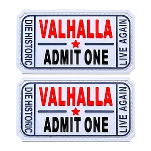 May include: Two white ticket-shaped patches with black and gray borders. The text "DIE HISTORIC" and "LIVE AGAIN" are printed vertically on the left and right sides of each patch. The text "VALHALLA" is printed in red letters with a black line above and below it. The text "ADMIT ONE" is printed in black letters below the red text. A red star is printed between the lines above and below the red text.