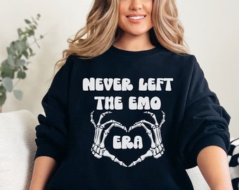 May include: Black sweatshirt with the text "Never Left The Emo Era" in white, with a skeleton hand heart graphic.