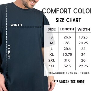 May include: Dark navy blue unisex tee shirt with a size chart. The chart shows length and width measurements in inches for sizes S to 3XL. The shirt is labeled as a 1717 unisex tee shirt.