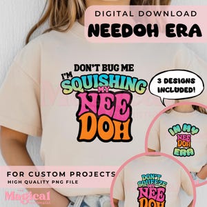 May include: A beige t-shirt featuring a graphic design with the text "DON'T BUG ME I'M SQUISHING MY NEE DOH" in black, blue, pink, and orange. The image includes two smaller circular insets showing variations of the design and text.