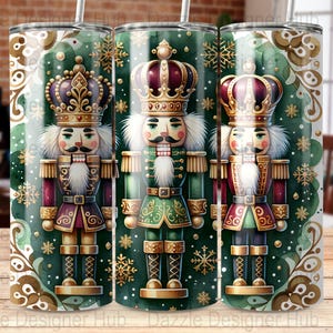May include: Three nutcracker themed stainless steel tumblers with green, gold, and white designs. Each tumbler features a different nutcracker with a red, gold, and purple crown.