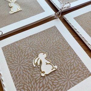 Tarjeta de Pascua, saludos de Pascua, tarjetas de felicitación de Pascua, conejito con borde dorado