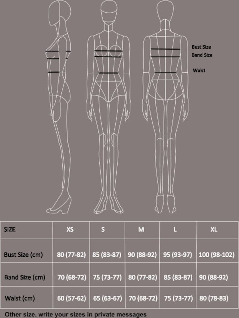 May include: A size chart for clothing with measurements in inches and centimeters. The chart shows bust, band, and waist sizes for XS, S, M, L, and XL.