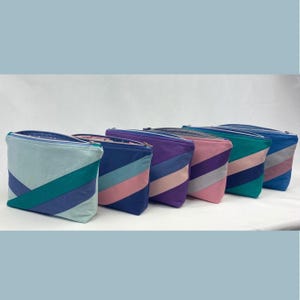 Petite trousse de maquillage avec fermeture éclair, trousse de maquillage moderne de différentes couleurs