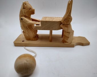 Russian vintage wooden bear and rabbit playing the piano toy