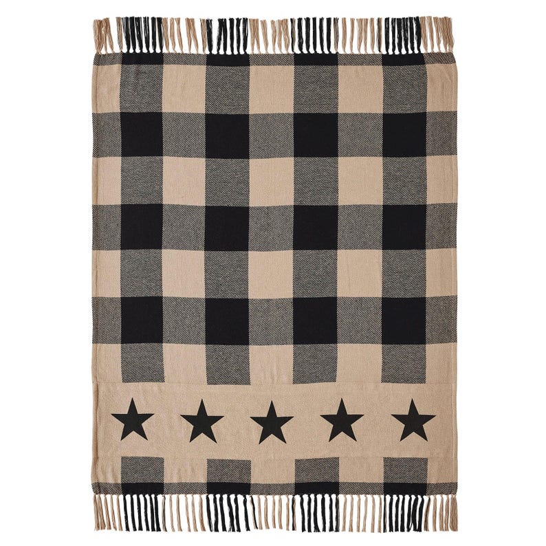 May include: A rectangular throw blanket featuring a black and beige buffalo check pattern. The lower section displays a horizontal band with five solid black stars. The top and bottom edges are finished with short, alternating black and beige fringe.