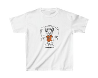 Kids Heavy Cotton™ Tee, girl jumping, girl playing, happy girl, girl, kids, jumping rope, niña saltando cuerda, niña