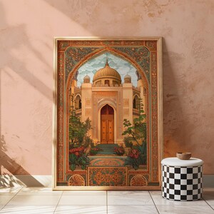 May include: A framed print depicting an ornate building with a golden dome and arched entrance. The artwork features intricate floral and geometric patterns in shades of orange, green, and blue. The print is leaning against a pink wall, next to a black and white checkered stool.