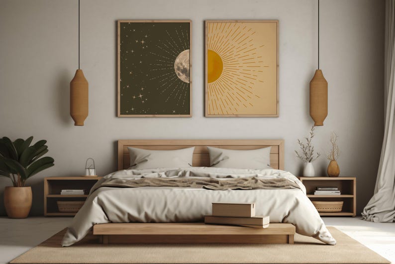 A minimalist bedroom featuring two framed sun and moon art prints centered above a wooden bed frame, flanked by matching nightstands with hanging woven pendant lights.