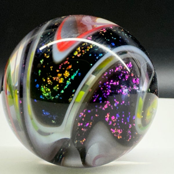 1.25 inch dichroic glass marble. Multi color.