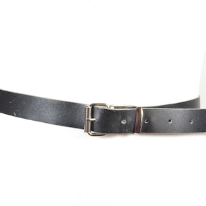 Skinny black leather belt