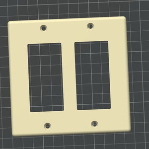 May include: A white plastic double-gang electrical wall plate with two rectangular openings for switches or outlets.