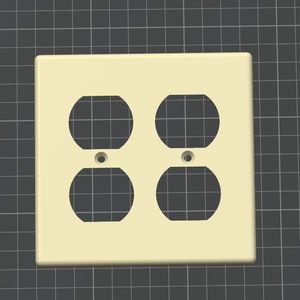 May include: A cream-colored electrical outlet cover with two double outlets.