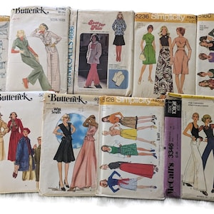 May include: A collection of vintage sewing patterns for clothing, including dresses, skirts, pants, and tops. The patterns are from various brands, including Simplicity, Butterick, and McCall's. The patterns are in various colors, including red, blue, green, and yellow.