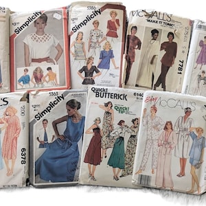 May include: A selection of vintage sewing patterns from brands including Simplicity, Butterick, and McCall's. The patterns depict illustrations of various garments, such as dresses, tops, and pyjamas. The covers display text such as "Fast & Easy" and pattern numbers.