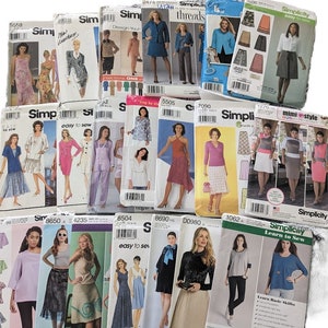 May include: A collection of Simplicity sewing patterns featuring various designs for dresses, skirts, tops, and suits. The patterns showcase different styles, including casual and formal wear, with images of the finished garments on the covers.