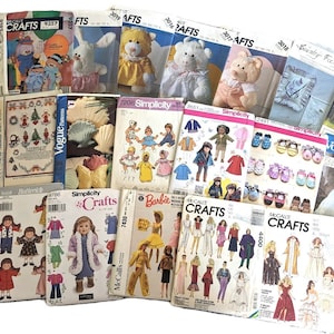 May include: A collection of vintage sewing patterns, including McCall's, Simplicity, Vogue, and Butterick. The patterns feature designs for dolls, clothing, and crafts. Some patterns show images of stuffed animals and holiday decorations.