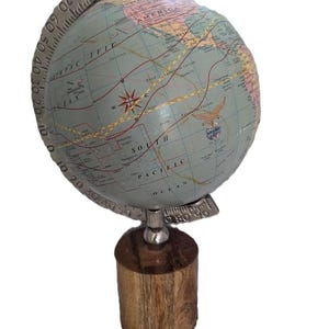 Vintage Revolving World Globe on Wooden Stand