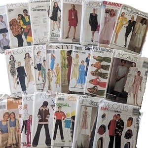 May include: A collection of vintage sewing patterns from brands like McCall's, Simplicity, and Butterick. The patterns feature illustrations of clothing designs, including dresses, suits, and blouses. The covers display various colors and styles, showcasing fashion trends.