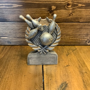 Sports trophy with engraved customized plate, 5.5” tall