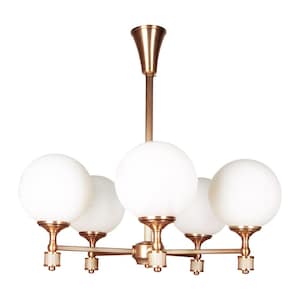 May include: A modern chandelier with a brass finish and five spherical, white glass shades. The fixture has a central stem and horizontal arms, creating a balanced and elegant design. The light fixture is suitable for a dining room or living room.