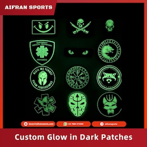 May include: A set of 12 glow-in-the-dark patches featuring various designs, including a skull and crossbones, a wolf, a compass, a raccoon, a spartan helmet, a cat, and a smiley face. The patches are all green and glow in the dark.