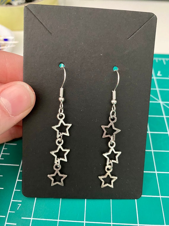 Orecchini pendenti con stella cava Color argento Hip Hop per le donne