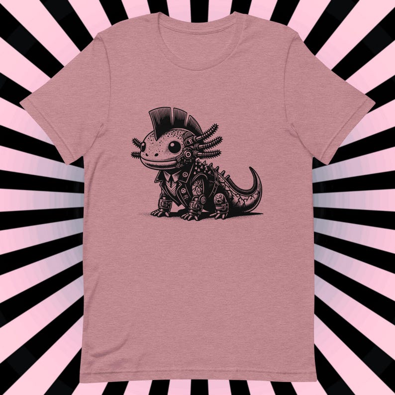 K&ouml;nnte beinhalten: Ein pinkfarbenes T-Shirt mit einer schwarz-wei&szlig;en Illustration eines Punk-Axolotl, das eine Lederjacke tr&auml;gt. Das Axolotl hat einen Irokesenschnitt und tr&auml;gt ein Nietenhalsband.