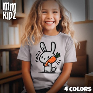 May include: A gray t-shirt with a cartoon bunny holding a carrot. The bunny is white with black eyes and a pink nose. The text "Hello?" is written above the bunny. The shirt has the text "4 COLORS" at the bottom.