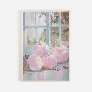 May include: A framed painting shows a still life of pink pumpkins. The pumpkins are arranged on a surface in front of a window. The painting uses soft brushstrokes and a pastel colour palette, creating a gentle and inviting aesthetic.