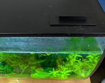 Tapa flexible para el orificio de alimentación Fluval para acuarios de 15 galones (57 litros).