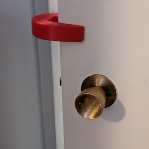 Fermaporta per gatti - Impedisce ai gatti di chiudere le porte