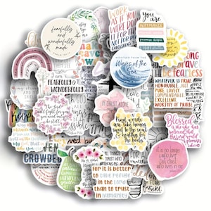 May include: A selection of circular stickers with motivational quotes and floral patterns. The stickers display phrases such as "Fearfully and Wonderfully Made" and "Blessed." Suitable for journaling, scrapbooking, or customising belongings.