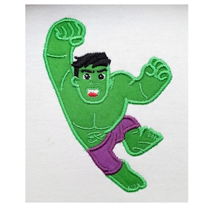 May include: Embroidered patch featuring a cartoon depiction of the Hulk. The character is green with black hair, purple shorts, and a red mouth. The Hulk is in a dynamic pose with one arm raised.