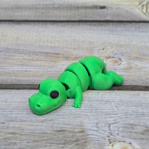 Articulated T-Rex Santa Claus Toy - 3D Printed Christmas Dinosaur Gift - Festive Posable Holiday Decor