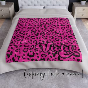 50x60 inch Crushed Velvet Blanket with hot pink & black Y2K inspired leopard pattern design. Can be customized with a name, in decorative retro font.