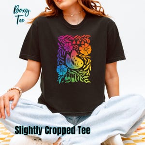 Black Shirts (Comfort Colors long or short sleeve or boxy tee, Gildan hoodie or crewneck sweatshirt or Next Level racerback tank) featuring Cottagecore Fox design in the subtle colors of the Gay Pride flag. LONG sleeves can be customized by adding on my sleeve customization listing in my shop.