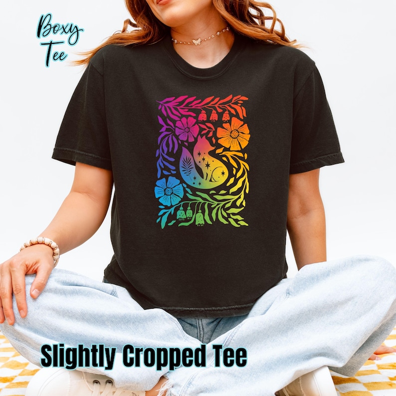 Black Shirts (Comfort Colors long or short sleeve or boxy tee, Gildan hoodie or crewneck sweatshirt or Next Level racerback tank) featuring Cottagecore Fox design in the subtle colors of the Gay Pride flag. LONG sleeves can be customized by adding on my sleeve customization listing in my shop.